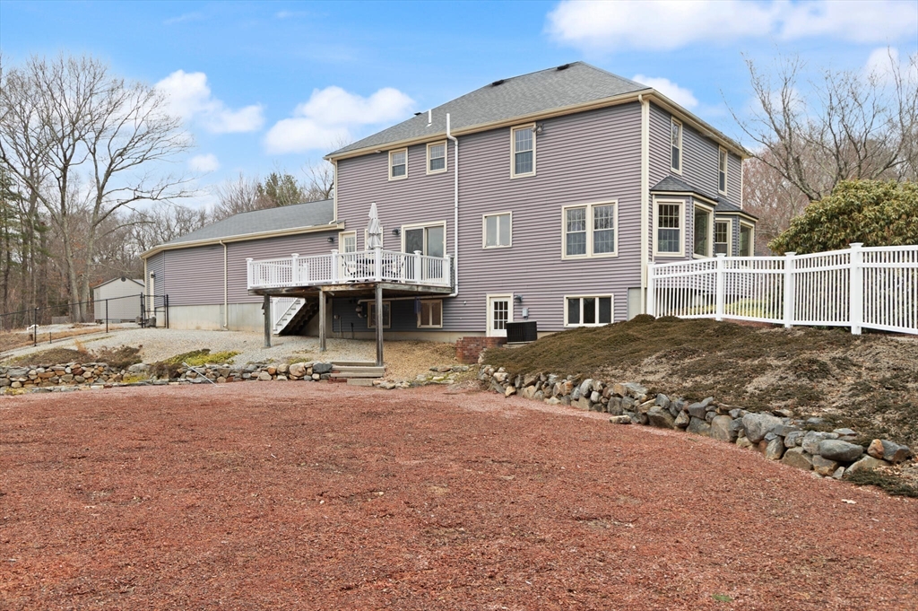 3 Daniels Road Mendon, MA 01756 - Photo 35 of 42 a front view of a house with a yard