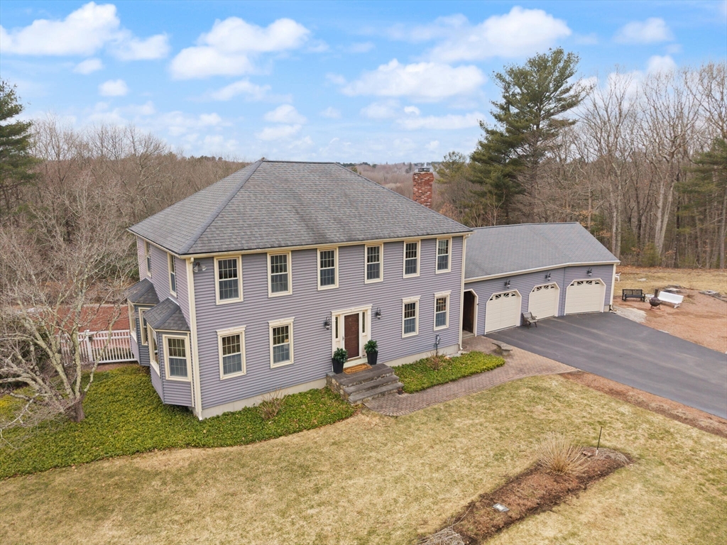3 Daniels Road Mendon, MA 01756 - Photo 37 of 42 front view of a house with a yard