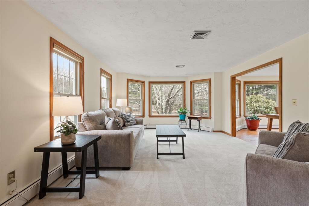 3 Daniels Road Mendon, MA 01756 - Photo 4 of 42 a living room with furniture and a large window