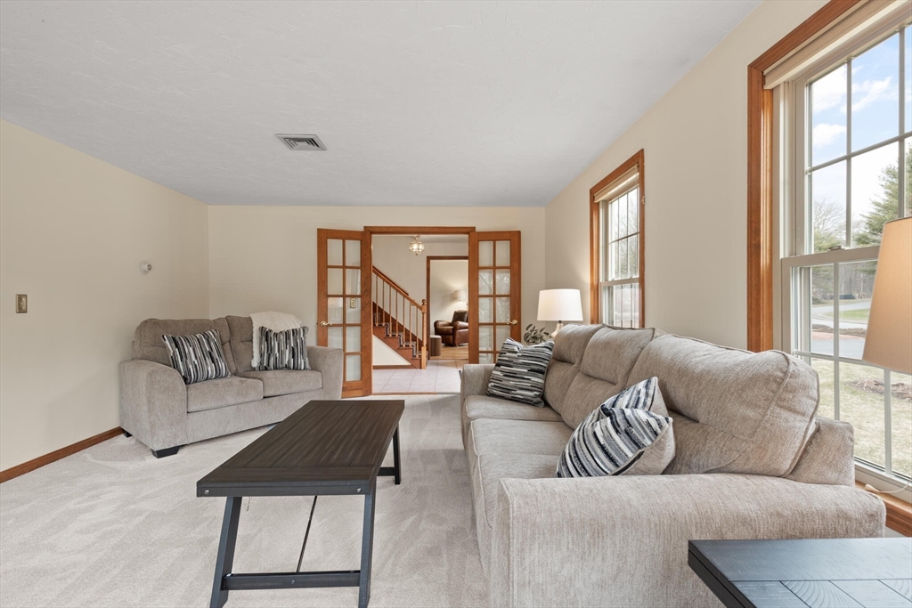 3 Daniels Road Mendon, MA 01756 - Photo 6 of 42 a living room with furniture and a large window