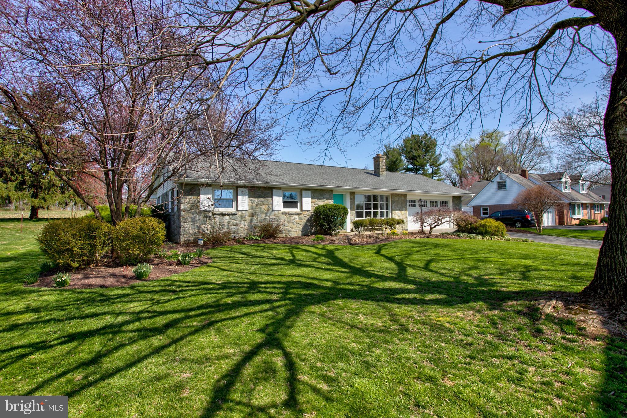 1853 Rockvale Road Lancaster, PA 17602 - Photo 1 of 43 a front view of a house with a yard