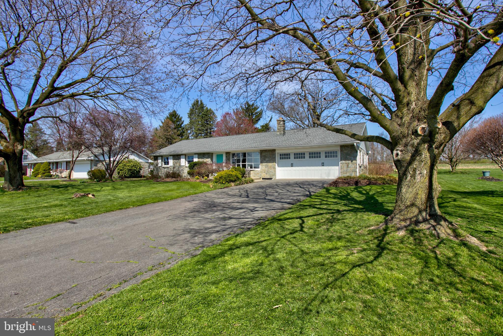 1853 Rockvale Road Lancaster, PA 17602 - Photo 5 of 43 a front view of a house with a yard