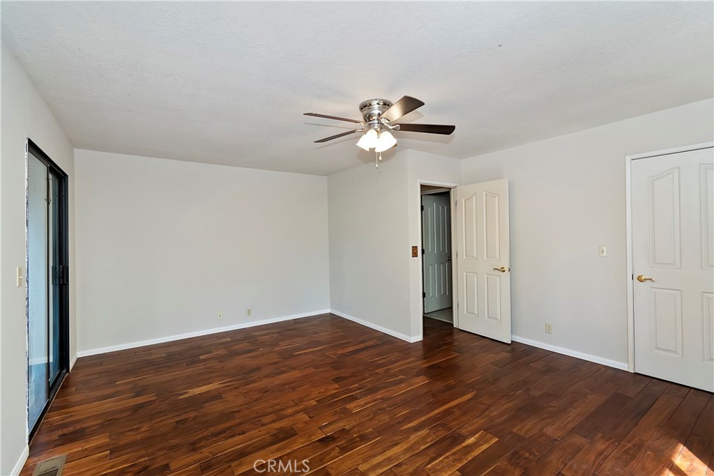 23919 Inspiration Crestline, CA 92325 - Photo 15 of 43 a view of an empty room with wooden floor