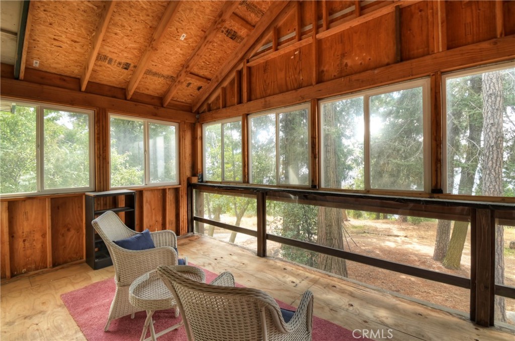23919 Inspiration Crestline, CA 92325 - Photo 17 of 43 a living room with large windows