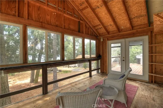 a view of a room with outdoor seating