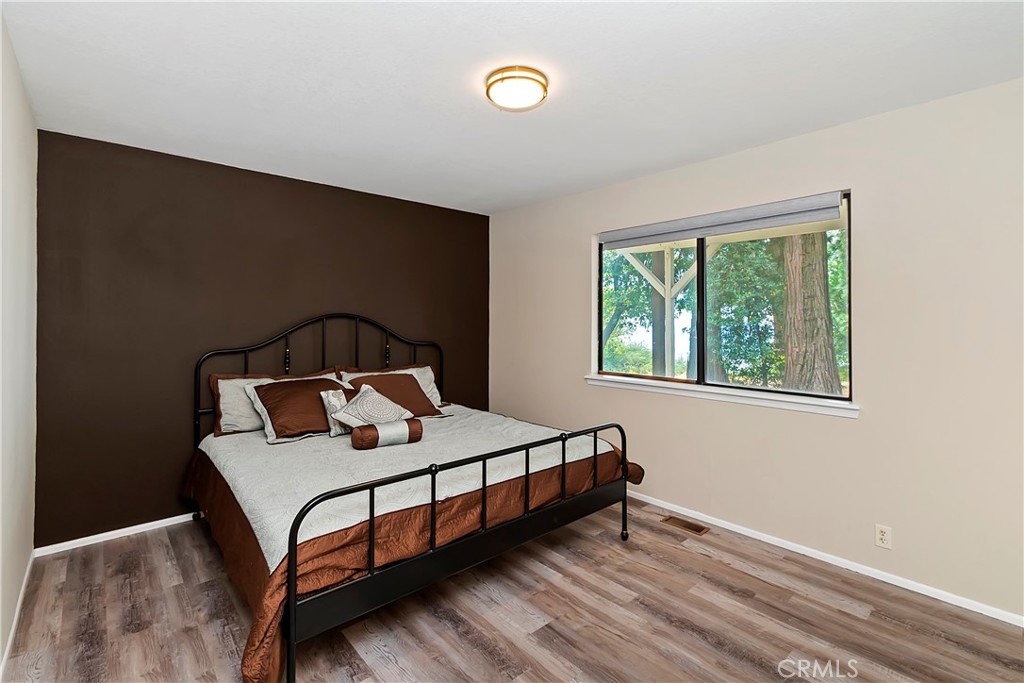 23919 Inspiration Crestline, CA 92325 - Photo 24 of 43 a bedroom with a bed and window