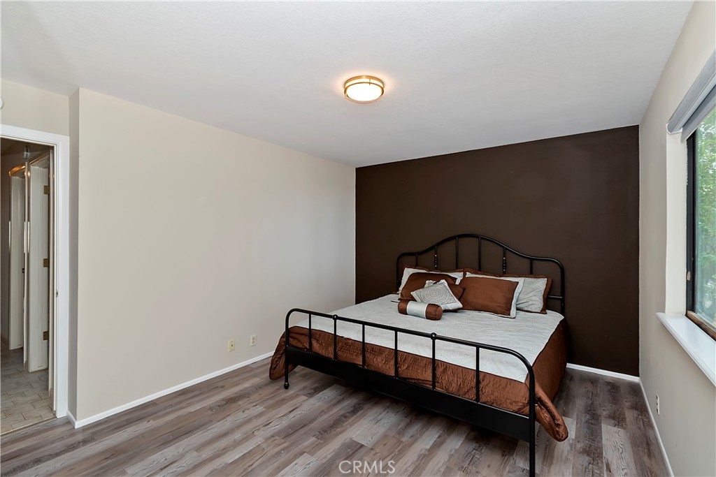 23919 Inspiration Crestline, CA 92325 - Photo 26 of 43 a bedroom with bed and a window