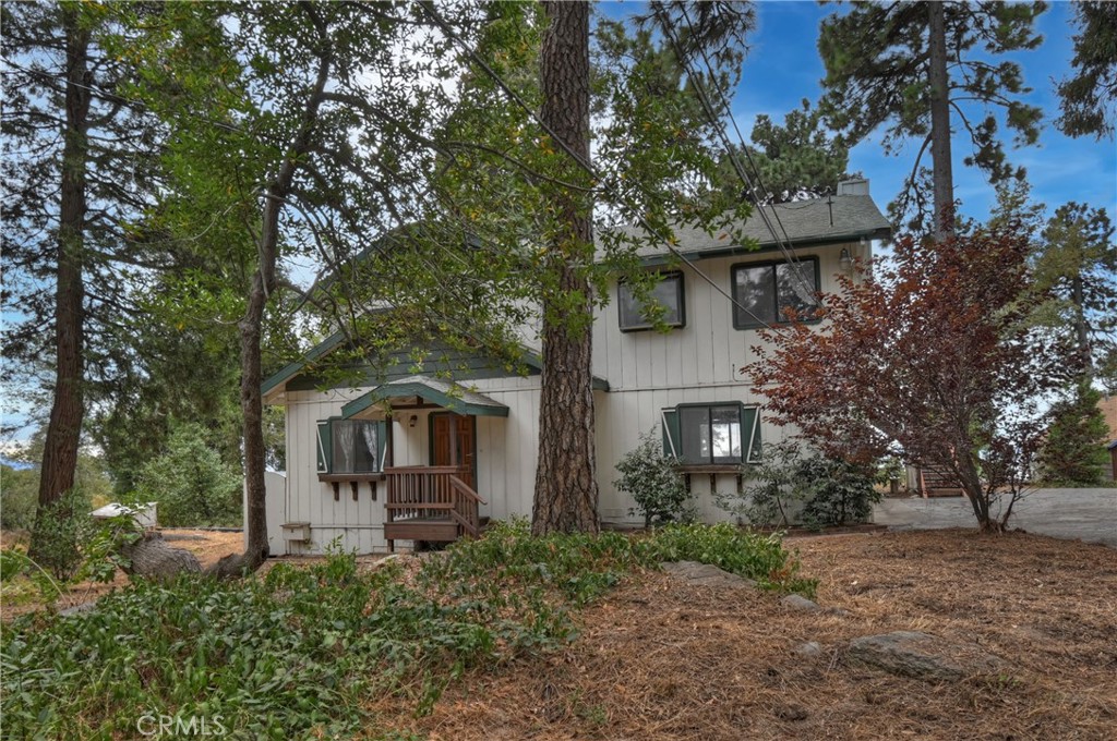 23919 Inspiration Crestline, CA 92325 - Photo 37 of 43 front view of a house with a tree