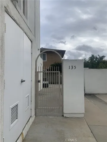 a view of balcony with car parked