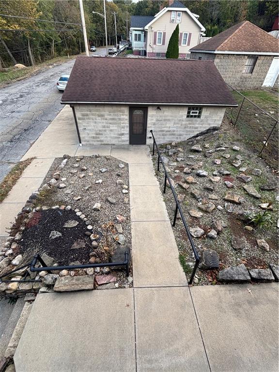 2662 Beaver Road Ambridge, PA 15003 - Photo 19 of 22 a front view of a house with a yard