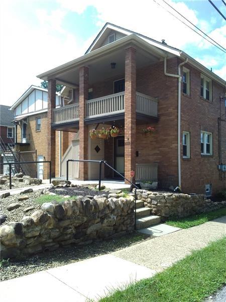 2662 Beaver Road Ambridge, PA 15003 - Photo 22 of 22 a front view of a house with a yard
