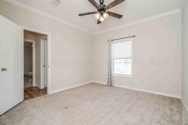 a workspace with furniture and window