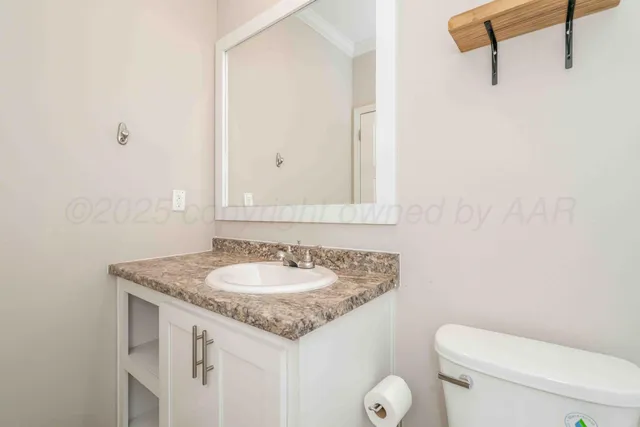 a view of storage and utility room with washer and dryer