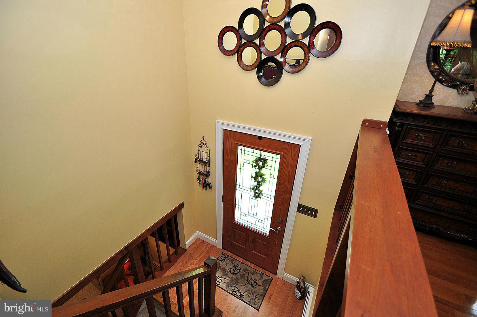 14829 Old Hanover Road Upperco, MD 21155 - Photo 5 of 30 a view of stairs with wooden floor