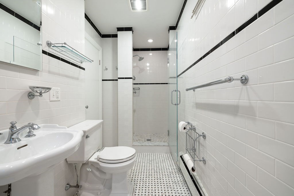 321 Tappan Street, Unit 2 Brookline, MA 02445 - Photo 15 of 25 a bathroom with a sink toilet and shower