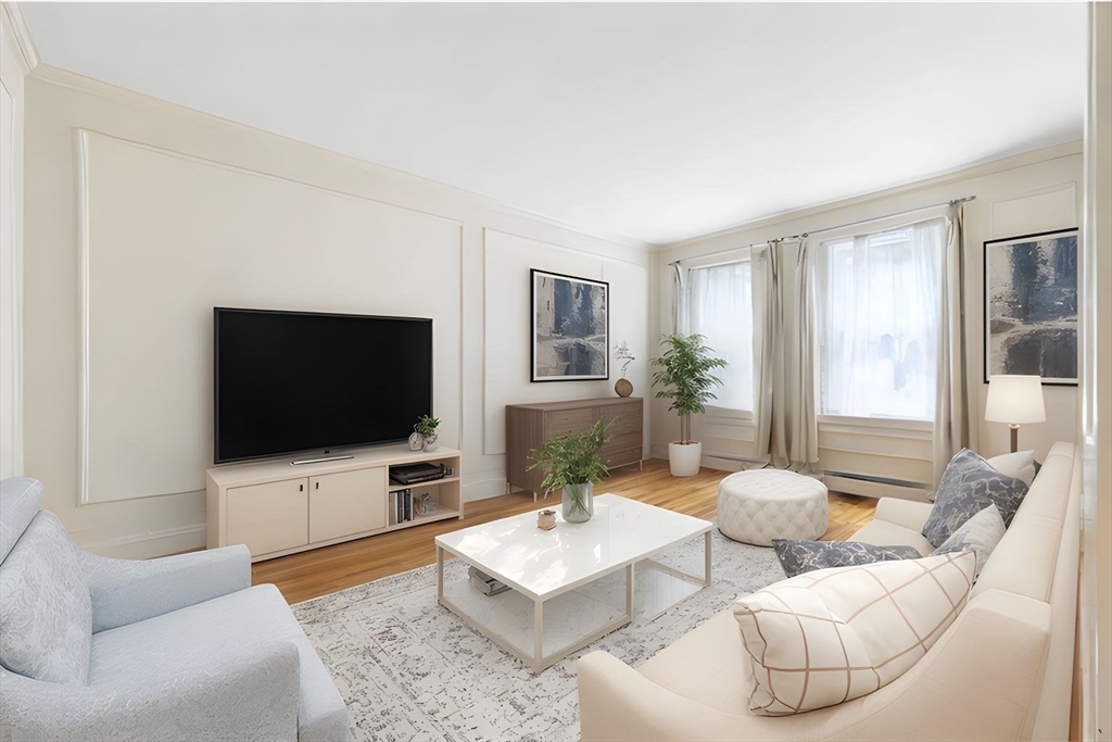 321 Tappan Street, Unit 2 Brookline, MA 02445 - Photo 3 of 25 a living room with furniture and a flat screen tv