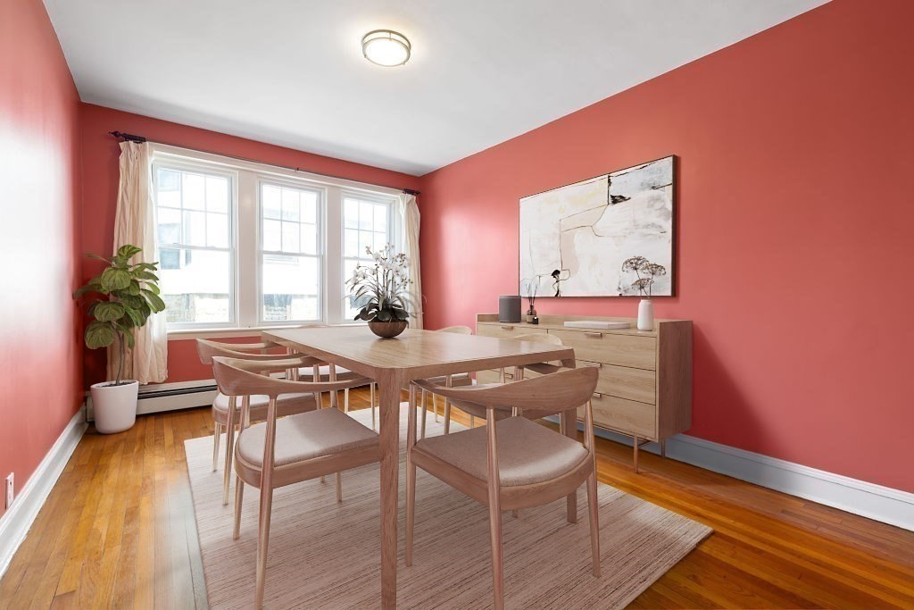 321 Tappan Street, Unit 2 Brookline, MA 02445 - Photo 9 of 25 a view of a dining room with furniture and wooden floor