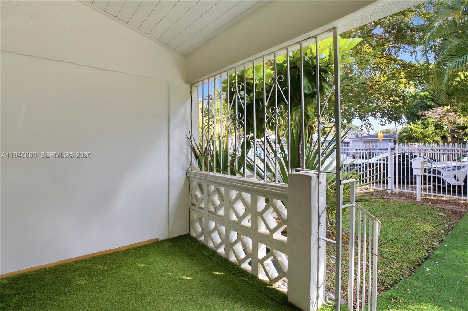 3318 Northwest 19th Avenue, Unit 1 Miami, FL 33142 - Photo 2 of 12 a view of a yard with plants