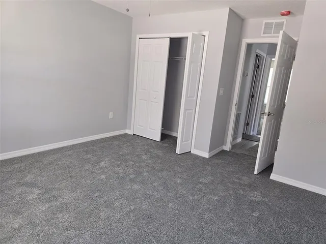 an empty room with a door