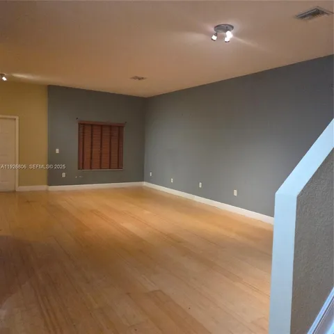 an empty room with window