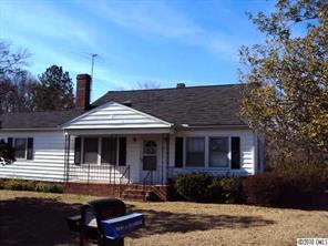 2471 Starnes Road Edgemoor, SC 29712 - Photo 1 of 10 a front view of a house with yard