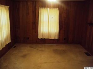 2471 Starnes Road Edgemoor, SC 29712 - Photo 5 of 10 an empty room with windows