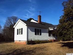 2471 Starnes Road Edgemoor, SC 29712 - Photo 8 of 10 a view of a white house with a yard