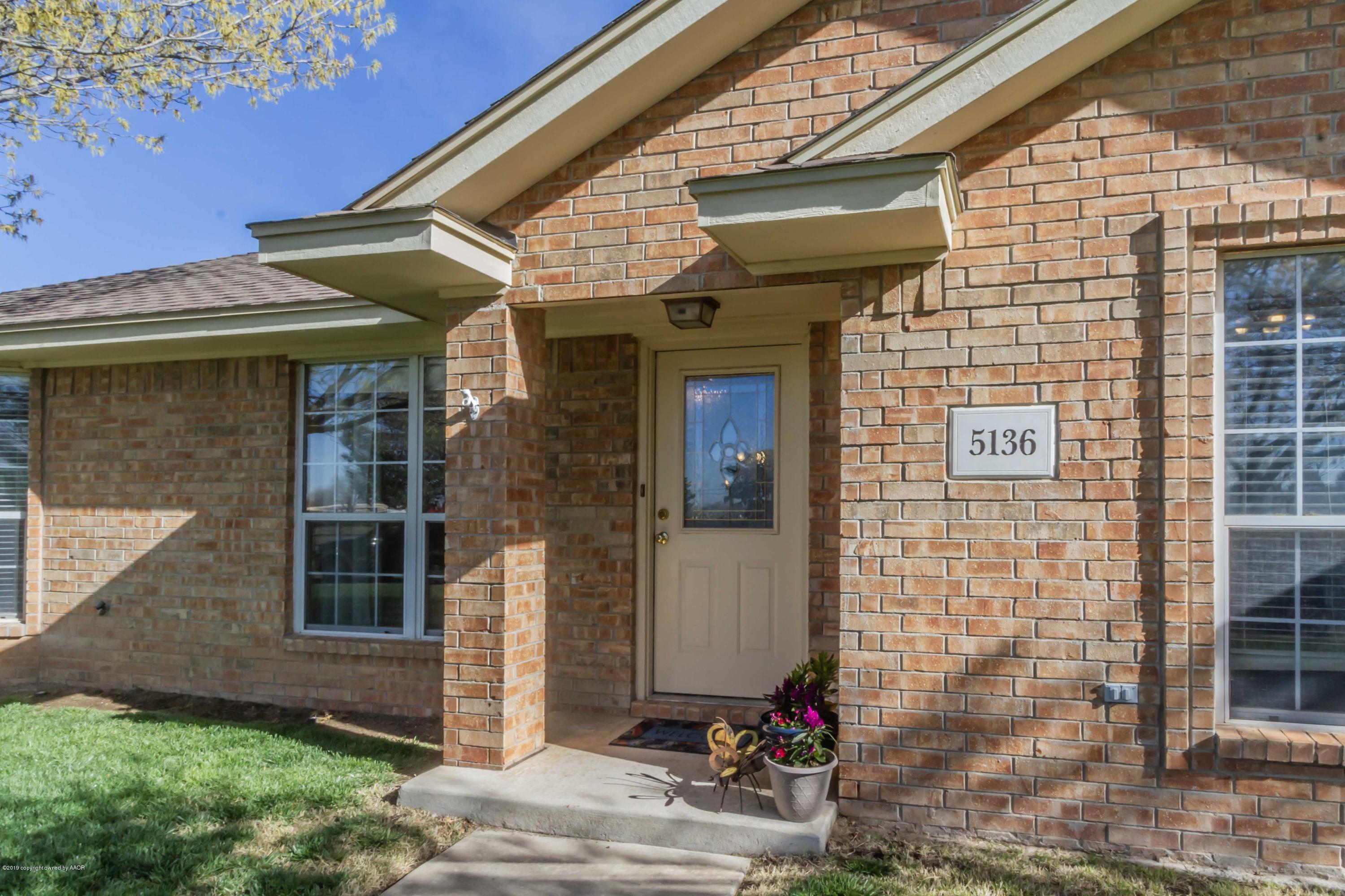 5136 Arden Road Amarillo, TX 79110 - Photo 2 of 41 a front view of a house