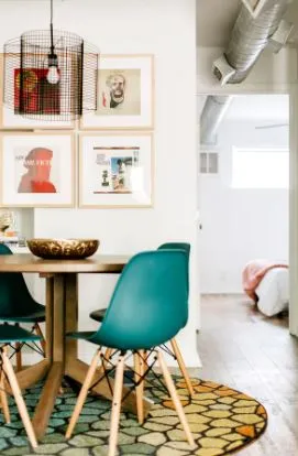 a bedroom with a bed and a bookshelf