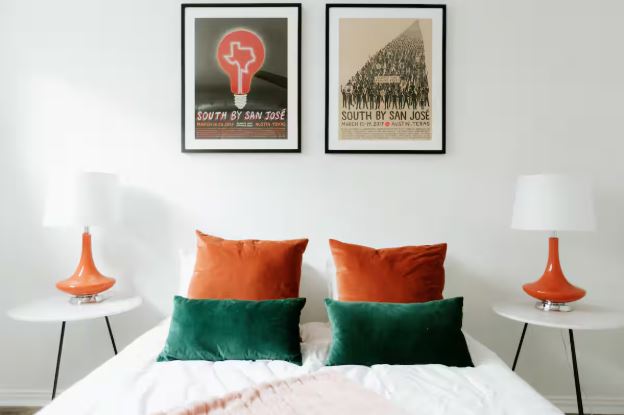 1510 West 6th Street, Unit 110 Austin, TX 78703 - Photo 15 of 18 a bedroom with a bed and a lamp on table