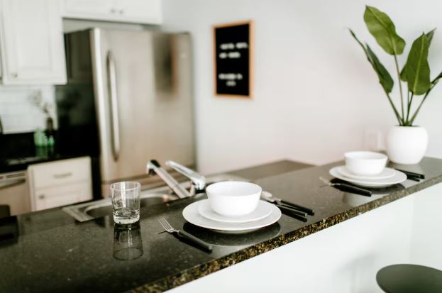 1510 West 6th Street, Unit 110 Austin, TX 78703 - Photo 10 of 18 a living room with furniture and a potted plant