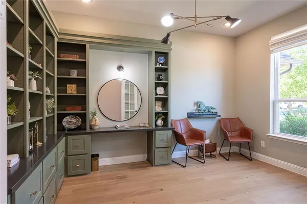 a view of a chair and table in a room