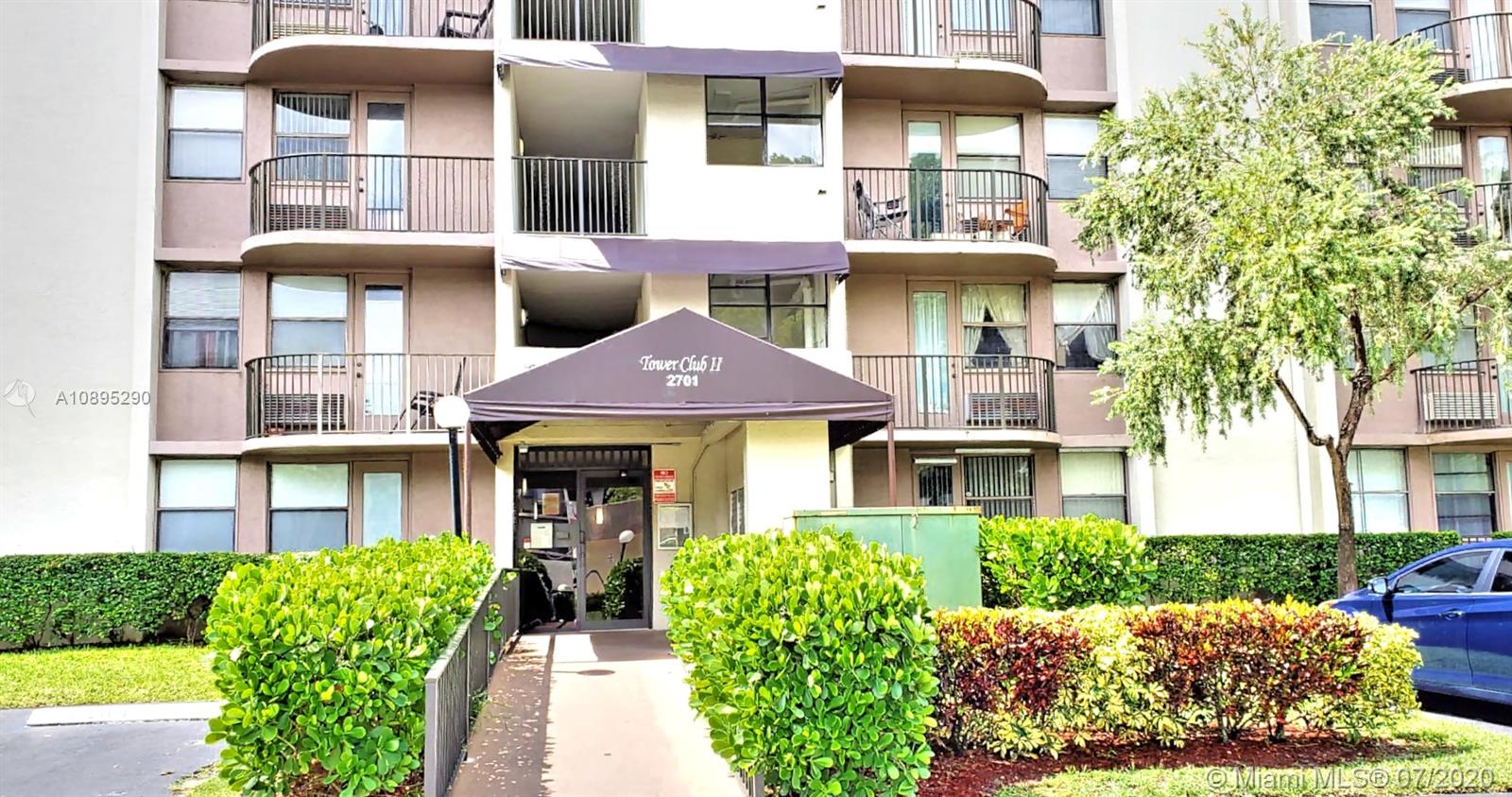 a front view of a multi story residential apartment building