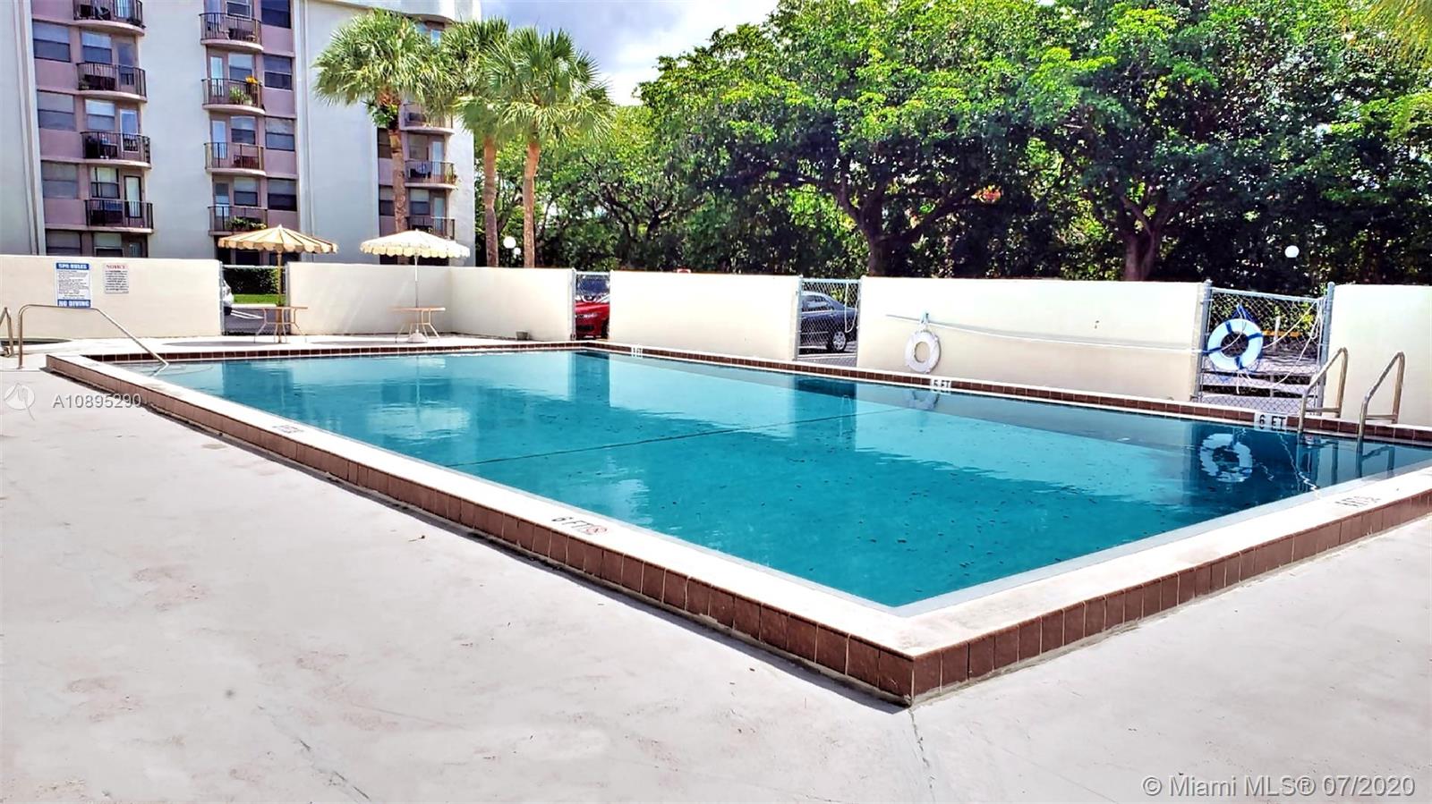 2701 Riverside Drive, Unit 514B Coral Springs, FL 33065 - Photo 19 of 22 a view of a pool table and chairs