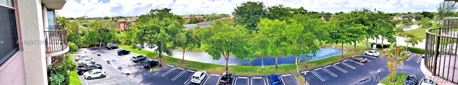 2701 Riverside Drive, Unit 514B Coral Springs, FL 33065 - Photo 20 of 22 a view of a backyard with plants