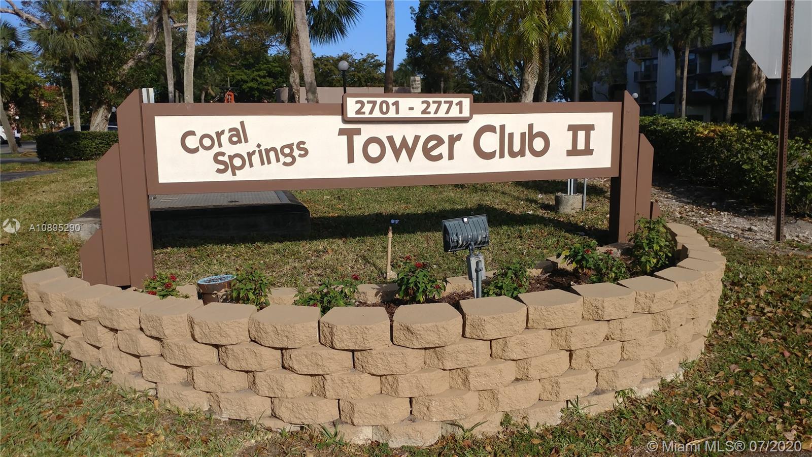 2701 Riverside Drive, Unit 514B Coral Springs, FL 33065 - Photo 22 of 22 a street sign on the side of a building