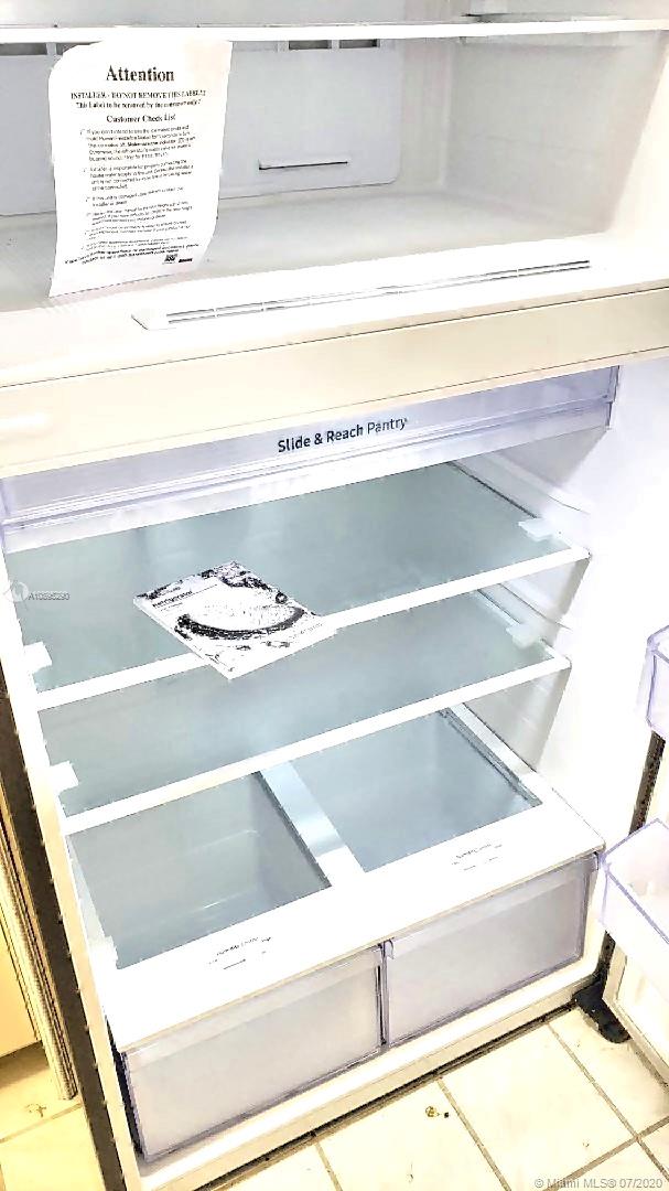 2701 Riverside Drive, Unit 514B Coral Springs, FL 33065 - Photo 6 of 22 a close up of a cabinet