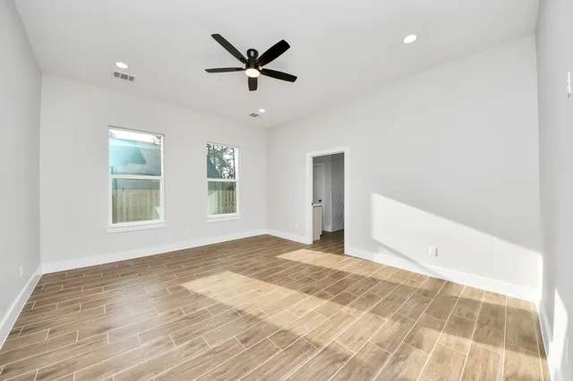 a spacious bathroom with a double vanity sink mirror and