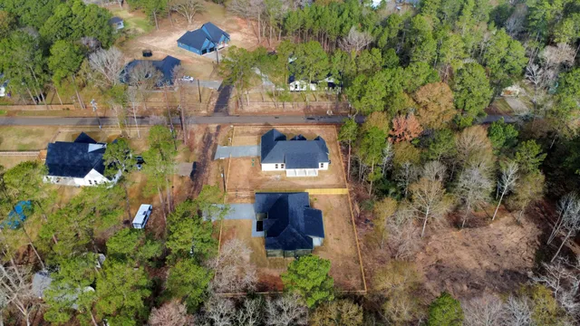 a bird view of a house with a small yard