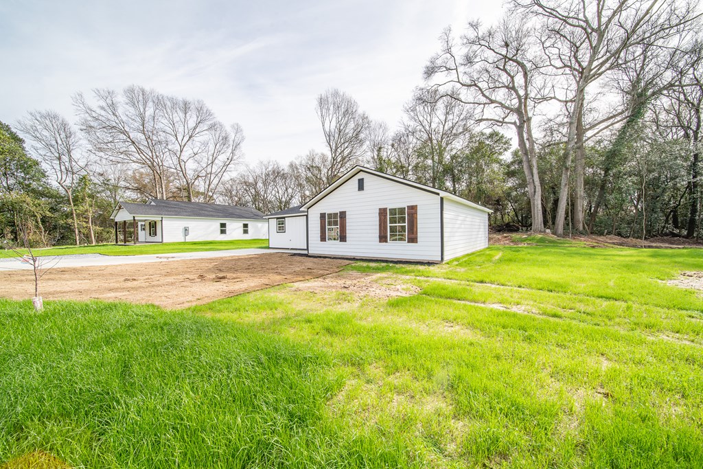 4402 Forrest Road Columbus, GA 31907 - Photo 4 of 28 a house view with swimming pool in front of it