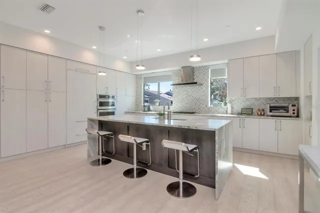 a view of a terrace with furniture and potted plants