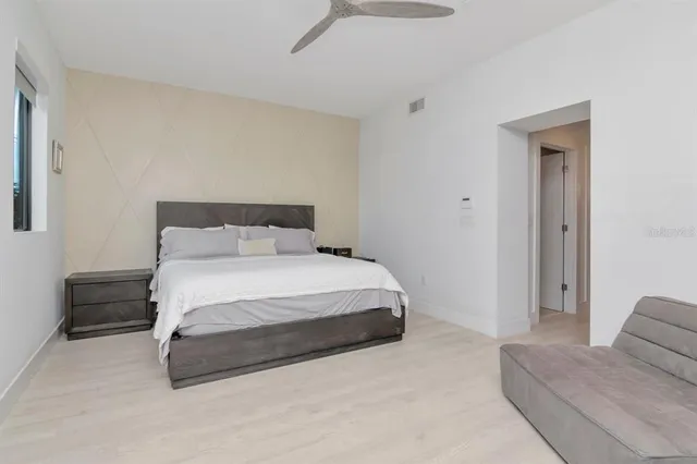 an aerial view of a house with lake view and mountain view
