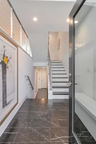 a view of a wooden door with a house