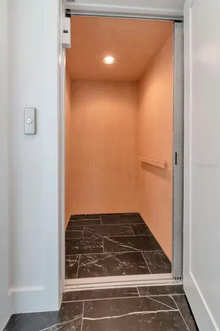 a kitchen with granite countertop a stove and a sink