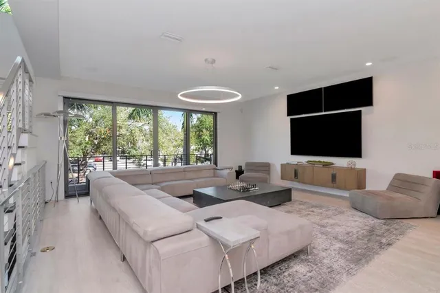a view of bathroom with a sink toilet and mirror