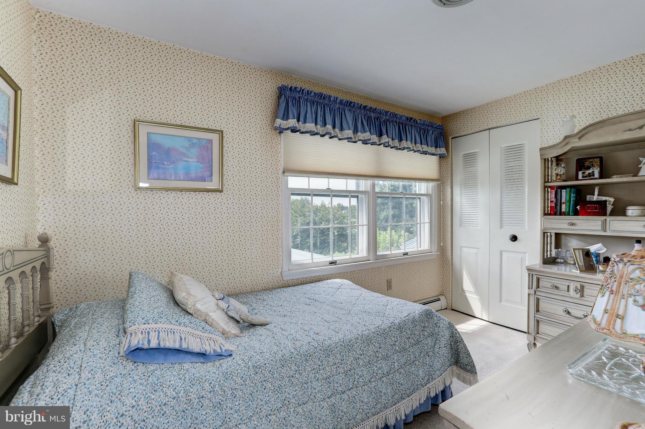 15511 Barnesville Road Boyds, MD 20841 - Photo 22 of 30 a bedroom with a bed and window