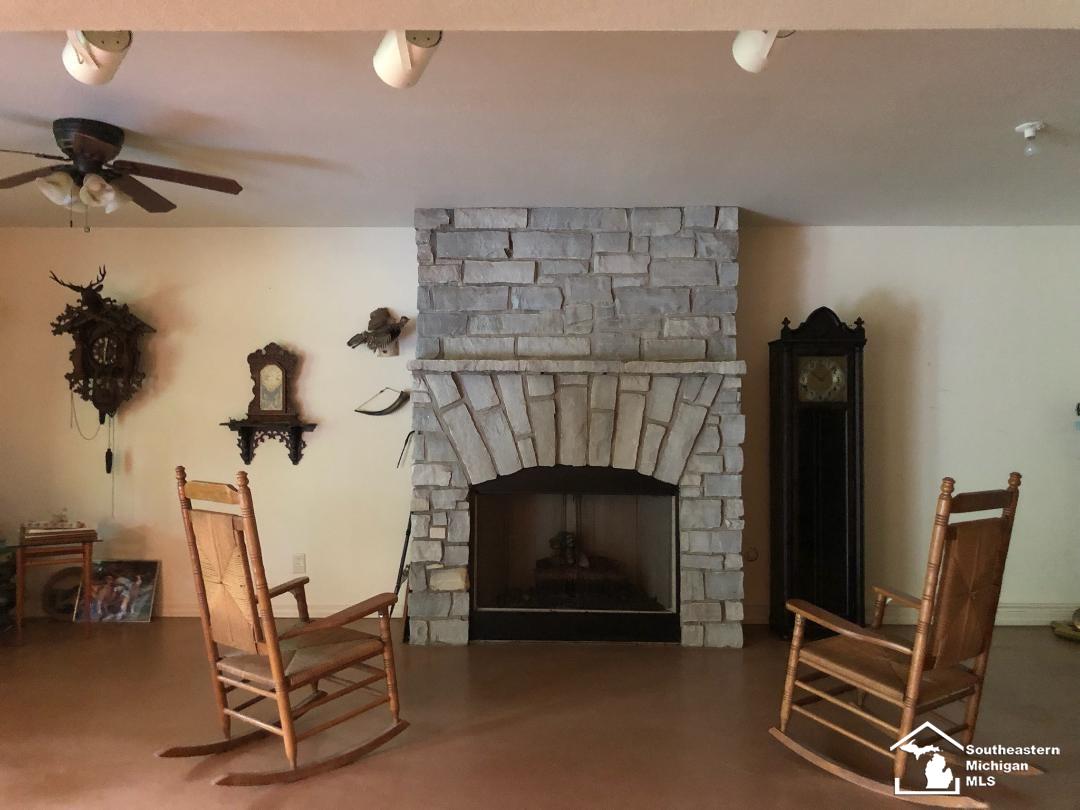 6729 Douglas Road Lambertville, MI 48144 - Photo 17 of 23 Basement Fireplace