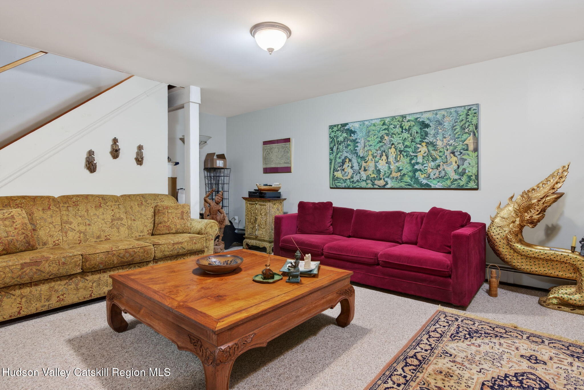 189 Bush Road Stone Ridge, NY 12484 - Photo 30 of 60 a living room with furniture and a couch