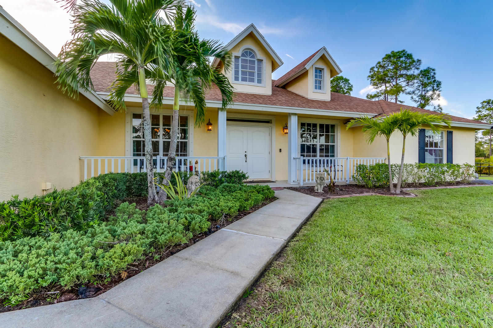 7955 Grapeview Boulevard Loxahatchee, FL 33470 - Photo 3 of 40 Front of Home