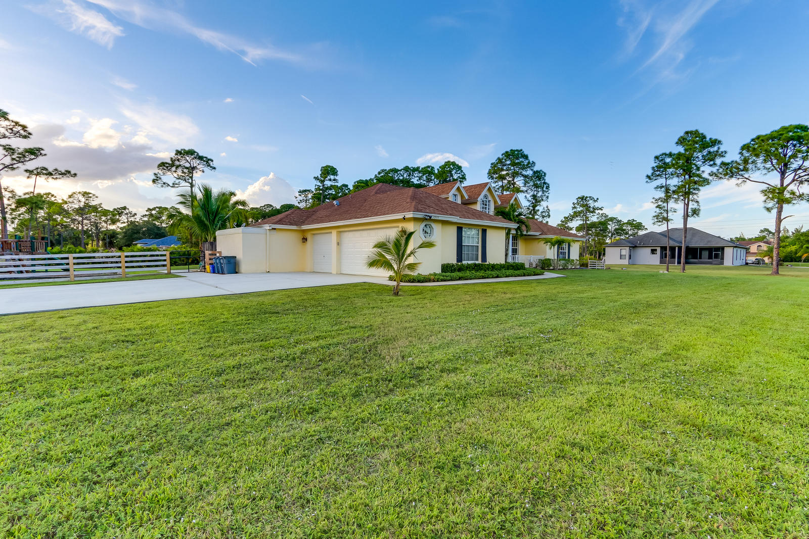 7955 Grapeview Boulevard Loxahatchee, FL 33470 - Photo 4 of 40 Front of Home